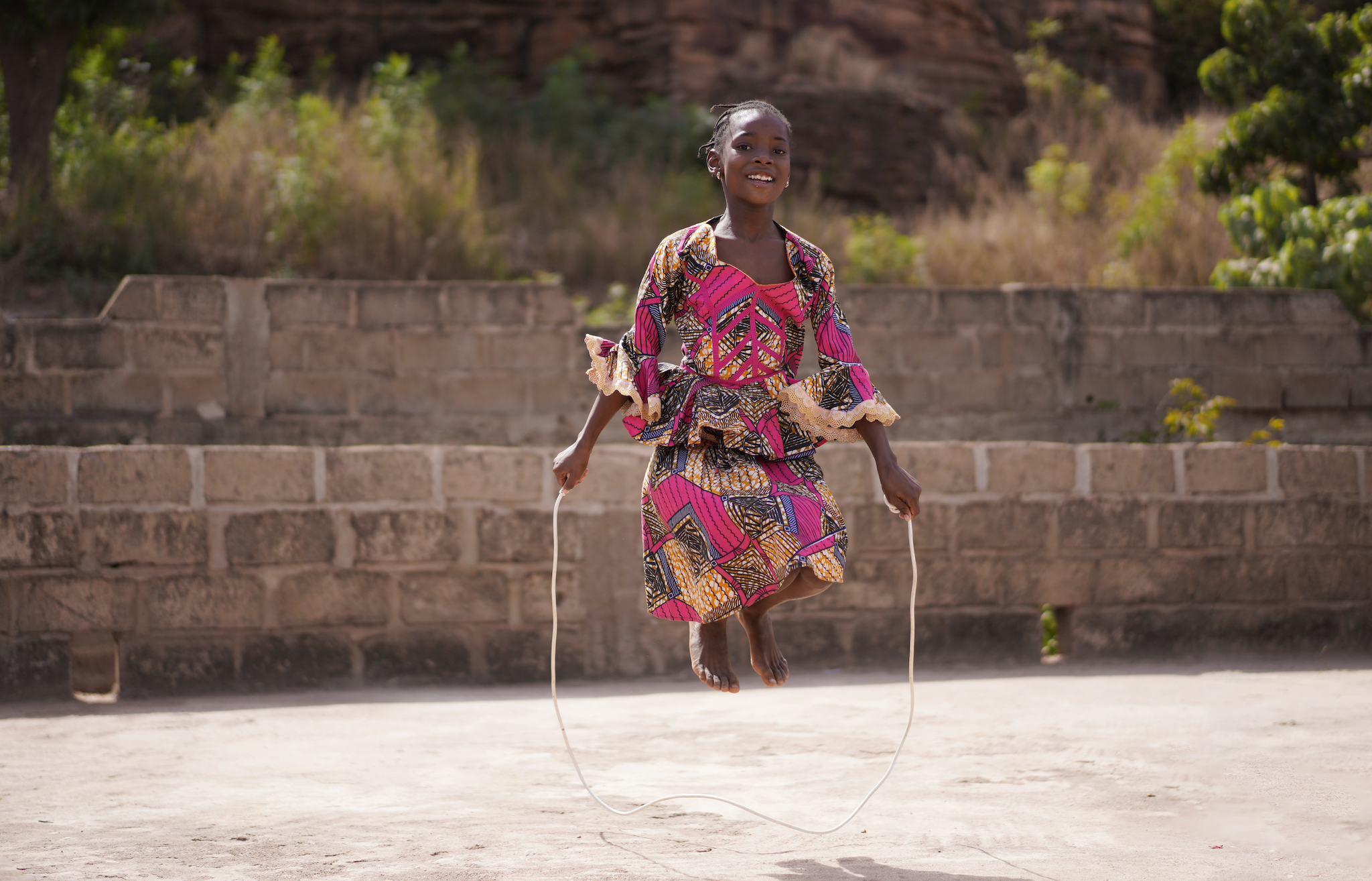 girl jumping with rope