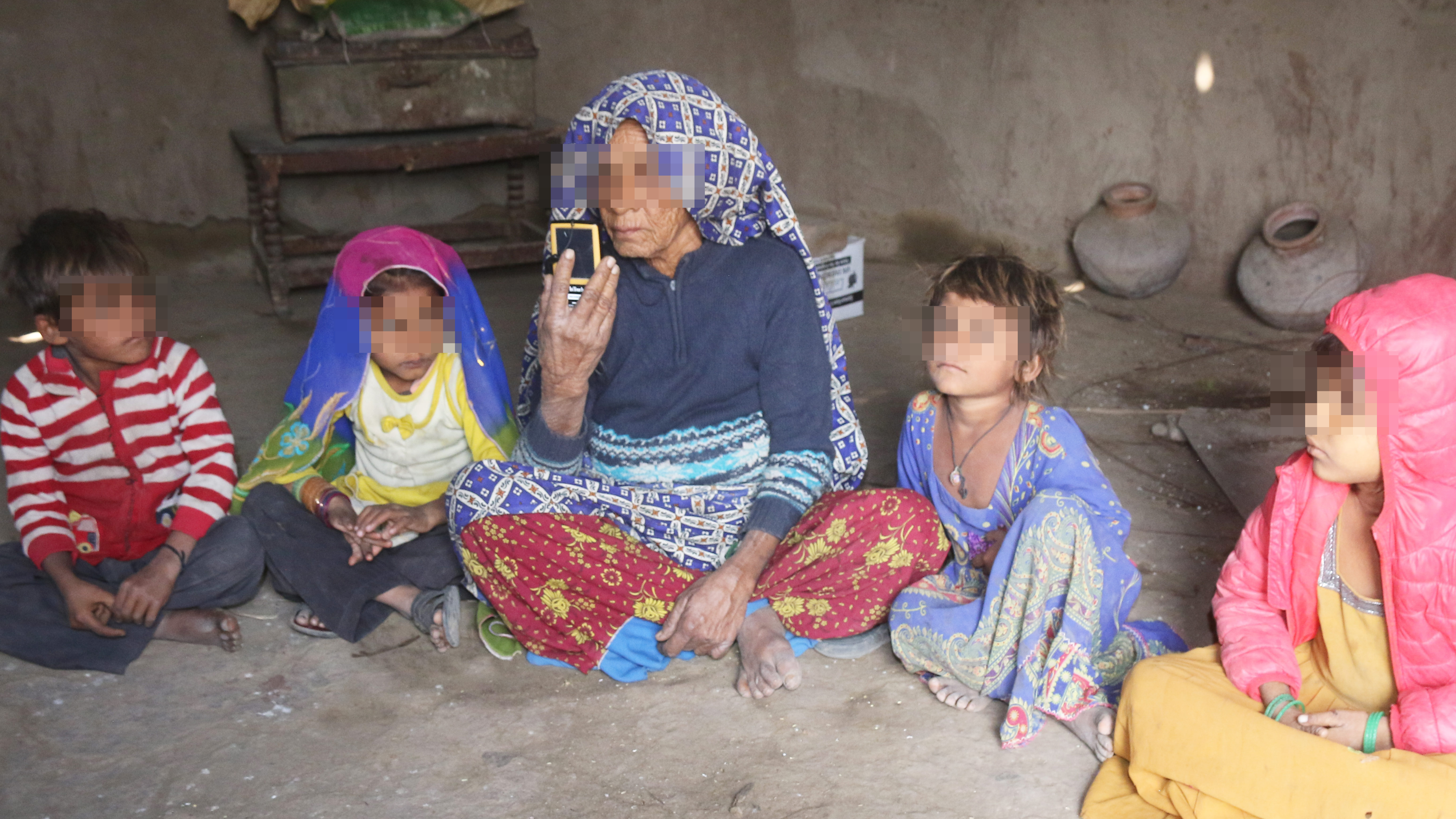 mother and children sitting down