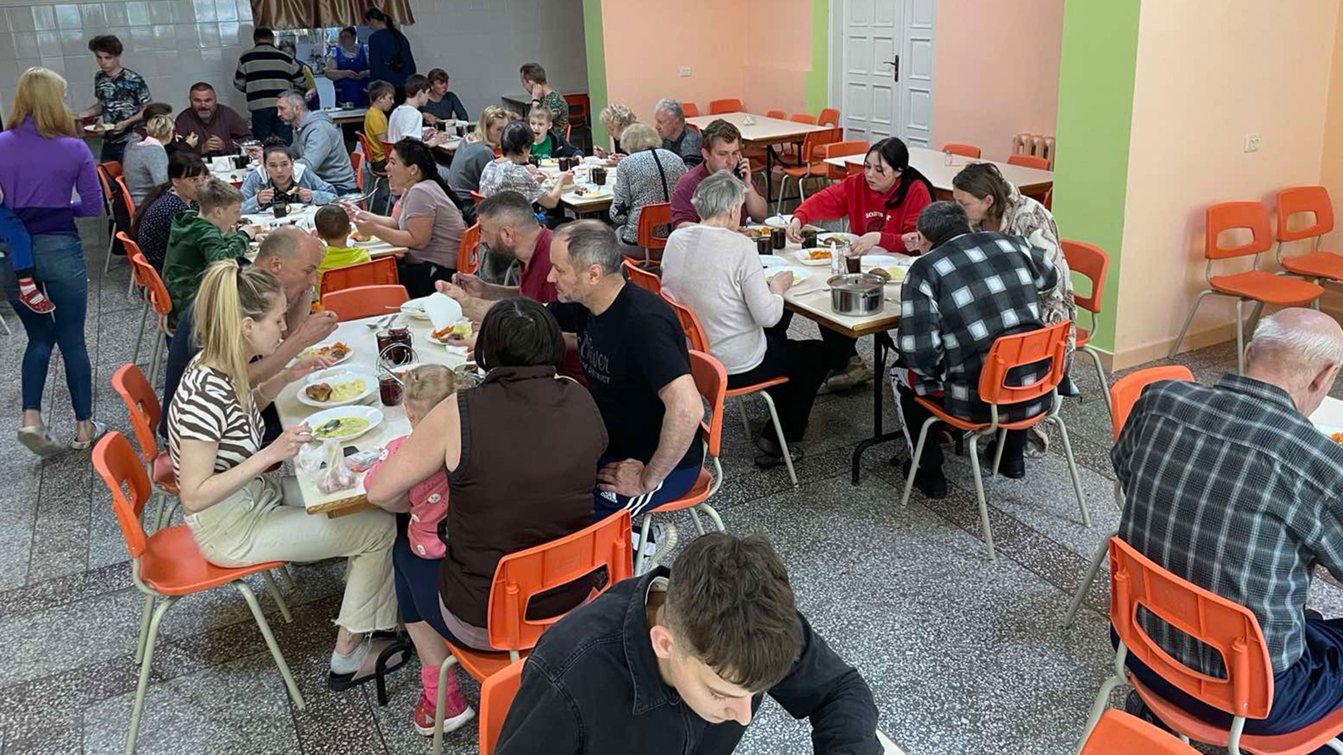 people eating in lunchroom